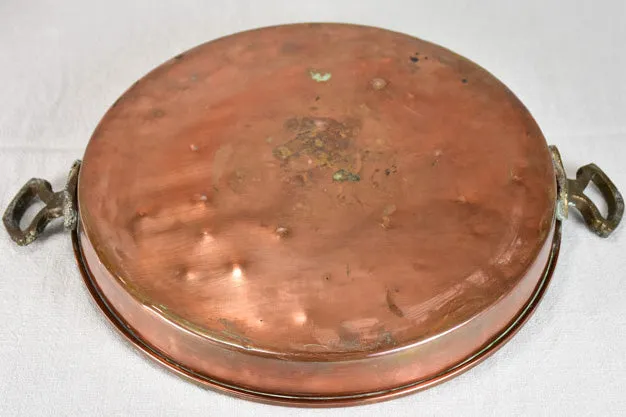 Two late nineteenth-century French copper cooking pots